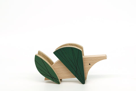 Wooden hedgehog with green color on a white background