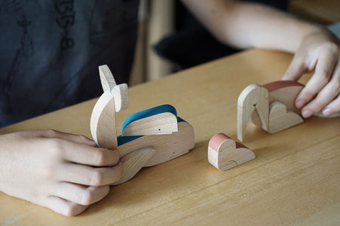 wooden magnetic whale toy and walrus toy